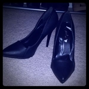 Black faux snake skin heels